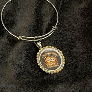 Silver Bangle Bracelet with Iridescent Crystal Monkey Charm